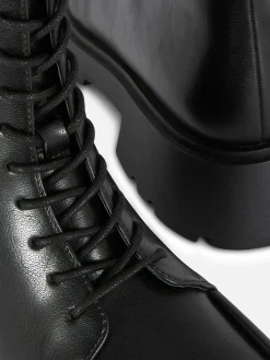Botines Ribeteados Con Cordones